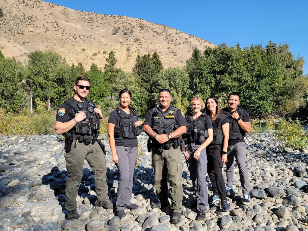 Adam Musgrove with sheriff's office team members.